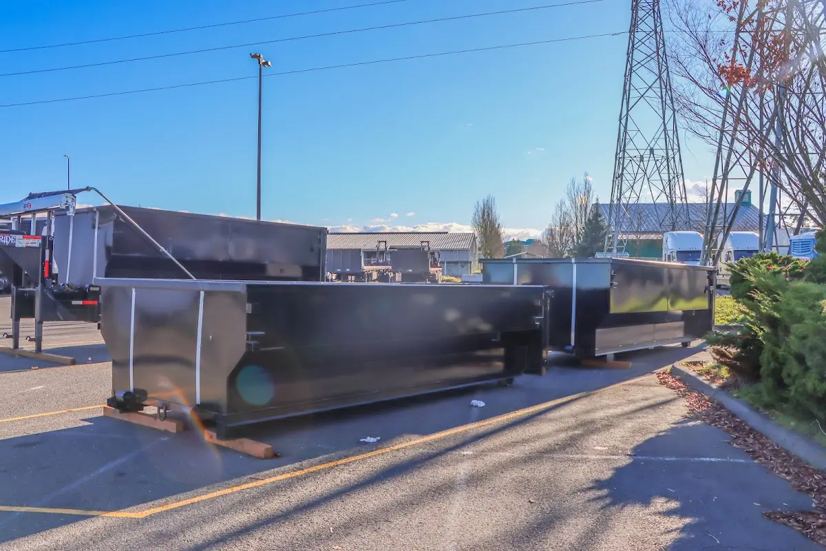 Roll-off dumpster ready for waste disposal at job site for 2 Yard Dumpster Rental in Martinsville